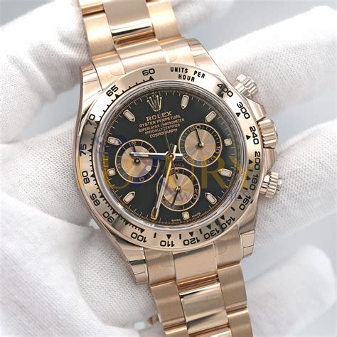 rolex daytona gold black dial